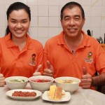 TEOH FATHER & DAUGHTER INTRODUCING THEIR HOME GENERATION RECIPES TO THE VISITORS IN 